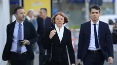 epa11676661 Gisele Pelicot (C), escorted by her lawyers Stephane Babonneau (R) and Antoine Camus (L), arrives at the criminal court in Avignon, France, 23 October 2024, where her ex-husband stands trial. Dominique Pelicot is accused of drugging and raping his then-wife Gisele Pelicot. He is also accused of inviting dozens of men to rape her while she was unconscious at their home in Mazan, France, between 2011 and 2020. Fifty other men are facing trial for their alleged involvement. Dominique Pelicot could face a maximum sentence of 20 years in prison if convicted. EPA/GUILLAUME HORCAJUELO