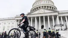 epa11494109 Police patrol a perimeter around the Capitol, as protesters gather on the day of the visit of Prime Minister of Israel Benjamin Netanyahu on Capitol Hill in Washington, DC, USA, 24 July 2024. Netanyahu's address to a joint meeting of the US Congress comes amid a close 2024 US presidential election cycle. Thousands of pro-Palestinian protesters were expected to gather near the US Capitol when Netanyahu becomes the first leader to address the US Congress four times. EPA/AARON SCHWARTZ