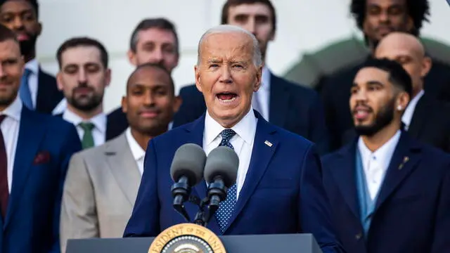 epa11733869 US President Joe Biden (C) welcomes the 2024 NBA champion Boston Celtics to the White House in Washington, DC, USA, 21 November 2024. President Biden accepted a Celtics jersey with his name on it from Celtics players Jayson Tatum and Derrick White. EPA/JIM LO SCALZO / POOL