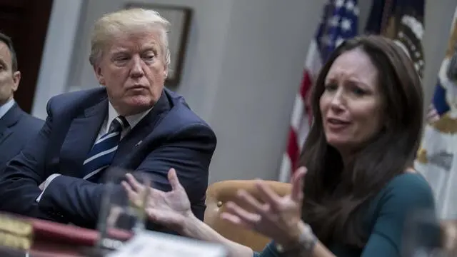 epa06431784 US President Donald J. Trump (L), listens as president and CEO of the Texas Public Policy Foundation Brooke Rollins (R) delivers remarks during a prison reform roundtable in the Roosevelt Room of the White House in Washington, DC, USA, 11 January 2018. The meeting that included governors, faith leaders and conservative activists was focused on programs to help prisoners re-enter the work force and reduce the rate of recidivism. EPA/SHAWN THEW