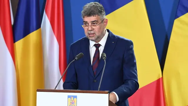 epa11734770 Romanian Prime Minister Marcel Ciolacu speaks during a press conference after a meeting with Hungarian Prime Minister Viktor Orban at the Prime Minister's office, the former Carmelite Monastery, in Budapest, Hungary, 22 November 2024. EPA/ZOLTAN MATHE HUNGARY OUT