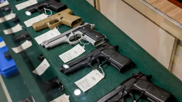 epa10030830 Handguns for sale at Chuck's Firearms gun store in Atlanta, Georgia, USA, 23 June 2022. Citing Second Amendment rights, the US Supreme Court overturned a New York state law regarding possessing a gun outside the home, as the US Senate debates gun safety measures in the wake of several deadly mass shootings. EPA/ERIK S. LESSER