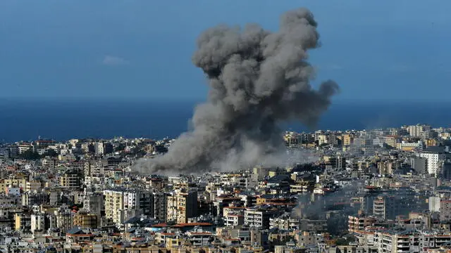 epa11725451 Smoke rises following an Israeli airstrike on the Dahieh district, south of Beirut, Lebanon, 17 November 2024. Israel's military stated on 17 November, it conducted 'intelligence-based' strikes on Hezbollah command centers and infrastructure in the Dahieh area of Beirut. According to the Lebanese Ministry of Health, more than 3,450 people have been killed and over 14,650 others have been injured in Lebanon since the escalation in hostilities between Israel and Hezbollah. EPA/WAEL HAMZEH