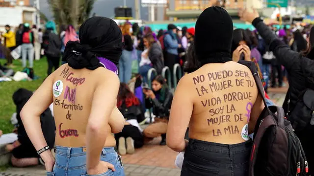 epa09604047 Women march during the International Day for the Elimination of Violence against Women in Bogota, Colombia, 25 November 2021. Thousands of women took to the streets of Bogota to express their rejection against sexist violence and to call for legal, free and safe abortion as part of the commemoration of the International Day for the Elimination of Violence against Women. EPA/Irene Escudero