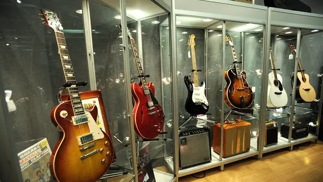 epa02614737 A view of some of the guitars owned by musician Eric Clapton, including a 2010 Gibson Eric Clapton 'Beano' Les Paul guitar (L), expected to sell for 20,000 - 30,000 US dollar, that are part of an auction to be held at Bonham's in New York, New York, USA, 04 March 2011. The Clapton collection of guitars and amplifiers are being auctioned to benefit the Crossroads Centre, Antigua, and the auctioned will be held in New York on 09 March 2011. EPA/JUSTIN LANE