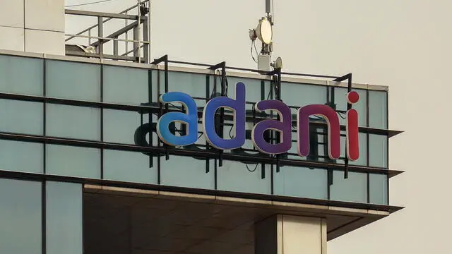 epa11735744 The logo of Adani Group atop a building in Mumbai, India, 23 November 2024. On 20 November 2024, The U.S. Securities and Exchange Commission (SEC) charged Adani Green Energy Ltd. executives Gautam Adani and Sagar Adani and Azure Power Global Ltd. executive Cyril Cabanes with participating in a bribery scheme designed to benefit the two renewable energy companies from a multi-billion dollar solar energy project awarded to them by the Indian government. EPA/DIVYAKANT SOLANKI