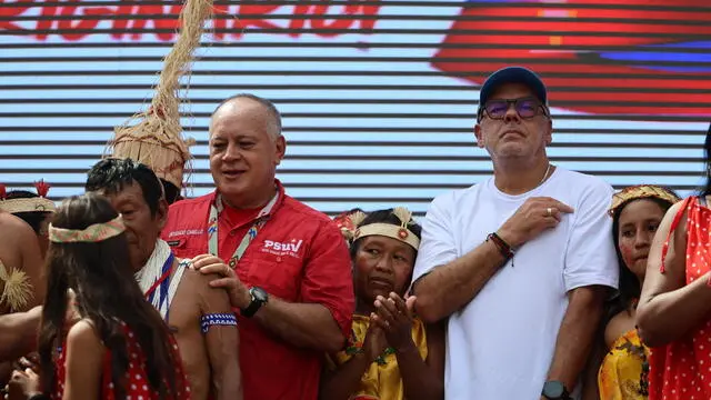 epa11656413 Diosdado Cabello (L), Minister of Interior and Justice of Venezuela, and Jorge Rodriuez (R), president of the National Assembly of Venezuela, attend an event on occasion of the Day of Indigenous Resistance, in Caracas, Venezuela, 12 October 2024. The march is held every October 12, in memory of the native peoples who fought against the Spanish colonization in 1492. EPA/MIGUEL GUTIERREZ