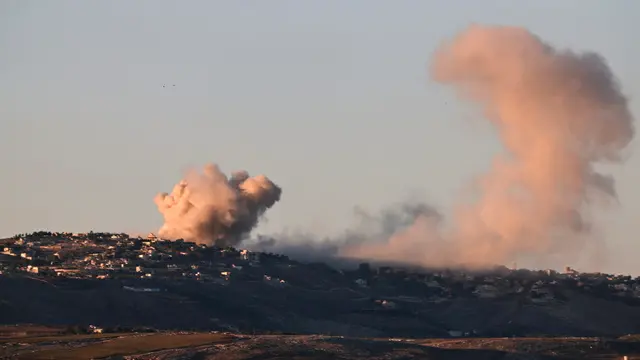 epaselect epa11741720 Smoke rises as a result of an Israeli airstrike on the southern Lebanese town of Al Khiam, as seen from northern Israel, 26 November 2024, amid cross-border hostilities between Hezbollah and Israel. On 26 November, Israel's Home Front Command announced new restrictions in several areas of northern Israel, adjusting the activity scale from 'partial activity' to 'limited activity', amid reports of a possible ceasefire between Israel and Hezbollah. No casualties were reported as a result of the strike on the town of Al Khiam in southern Lebanon. EPA/ATEF SAFADI