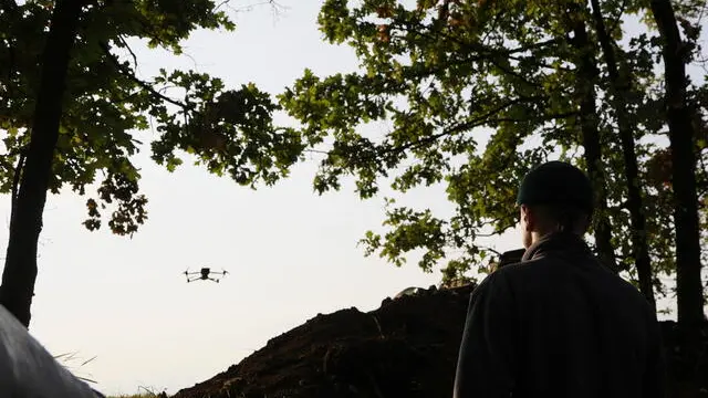 epa10715940 A Ukrainian serviceman flies a drone at an undisclosed location along the frontline in the Donetsk direction, Ukraine, 28 June 2023, amid the Russian invasion. The drones are used for intelligence-gathering and sometimes for attacks on enemy positions by dropping small bombs. Russian troops entered Ukrainian territory in February 2022, starting a conflict that has provoked destruction and a humanitarian crisis. EPA/ALEX BABENKO