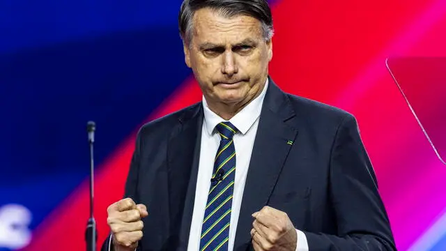 epa10503479 Former President of Brazil Jair Bolsonaro speaks at the Conservative Political Action Conference (CPAC), billed as the largest conservative gathering in the world, at the Gaylord National Resort & Convention Center in National Harbor, Maryland, USA, 04 March 2023. Though this year’s speakers include former US President Donald Trump and former Brazilian President Jair Bolsonaro, many other conservatives are skipping the conference after a male campaign aid accused CPAC Chair Matt Schlapp of sexual assault. EPA/JIM LO SCALZO