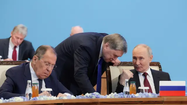 epa11745352 Russian Foreign Minister Sergei Lavrov (L), Russian President Vladimir Putin (C) and Russian Presidential Aide Yuri Ushakov (C) attend the Collective Security Council (CSC) meeting of the Collective Security Treaty Organisation (CSTO) in Astana, Kazakhstan, 28 November 2024. Putin is on a two-day visit to Kazakhstan. EPA/GAVRIIL GRIGOROV / SPUTNIK / KREMLIN POOL