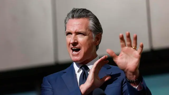 epa11690819 California Governor Gavin Newsom speaks during a news conference at the Downtown Women's Center in Los Angeles, California, USA, 29 October 2024. A new state funding grant of $827 million was announced at the press conference to address the ongoing homeless crisis. EPA/CAROLINE BREHMAN