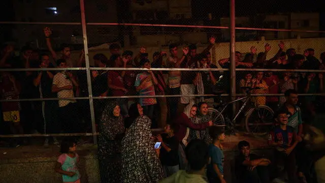 epa11442182 Palestinians react as wounded are transported to Nasser Hospital in Khan Yunis, following an Israeli army strike in the Mawasi Khan Yunis area in the southern Gaza Strip, 27 June 2024. EPA/HAITHAM IMAD