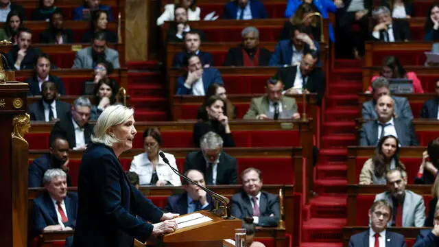 epa11756903 Rassemblement National (RN) parliamentary group President Marine Le Pen delivers a speech during a no-confidence vote against French prime minister and his government at the National Assembly, in Paris, France, 04 December 2024. The no-confidence vote comes after the French prime minister activated Article 49.3 of the Constitution to pass his social security budget bill without a vote, as a majority of members of Parliament rejected his project on 02 December 2024. EPA/YOAN VALAT