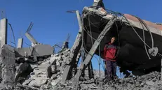 epaselect epa11755960 A Palestinian man stands among the rubble of his destroyed house following an Israeli airstrike in Deir Al Balah, central Gaza Strip, 04 December 2024. According to the Palestinian Ministry of Health in Gaza, at least three Palestinians were killed following overnight Israeli airstrikes in central Gaza. More than 44,500 Palestinians and over 1,400 Israelis have been killed, according to the Palestinian Health Ministry and the Israeli Army, since Hamas militants launched an attack against Israel from the Gaza Strip on 07 October 2023, and the Israeli operations in Gaza and the West Bank which followed it. EPA/MOHAMMED SABER