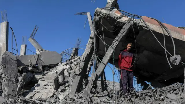 epaselect epa11755960 A Palestinian man stands among the rubble of his destroyed house following an Israeli airstrike in Deir Al Balah, central Gaza Strip, 04 December 2024. According to the Palestinian Ministry of Health in Gaza, at least three Palestinians were killed following overnight Israeli airstrikes in central Gaza. More than 44,500 Palestinians and over 1,400 Israelis have been killed, according to the Palestinian Health Ministry and the Israeli Army, since Hamas militants launched an attack against Israel from the Gaza Strip on 07 October 2023, and the Israeli operations in Gaza and the West Bank which followed it. EPA/MOHAMMED SABER