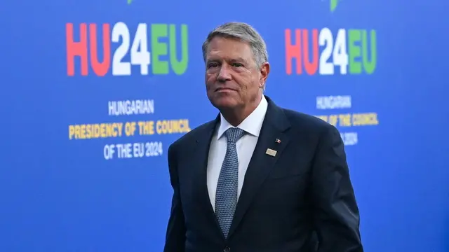 epa11709476 Romanian President Klaus Iohannis arrives for an informal summit of the European Council at the Puskas Arena in Budapest, Hungary, 08 November 2024. The informal meeting takes place following the fifth European Political Community summit. Hungary is holding the presidency of the European Council until 31 December. EPA/SZILARD KOSZTICSAK HUNGARY OUT