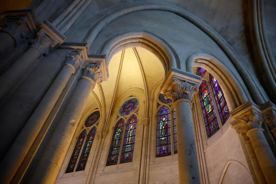 epa11764342 View of the stained glass windows during the inaugural Mass, with the consecration of the high altar, at the Notre-Dame de Paris Cathedral in Paris, France, 08 December 2024. The Notre Dame de Paris Cathedral reopened on 07 December after nearly six years of renovation work following its destruction by a fire on 15 April 2019. EPA/SARAH MEYSSONNIER / POOL MAXPPP OUT