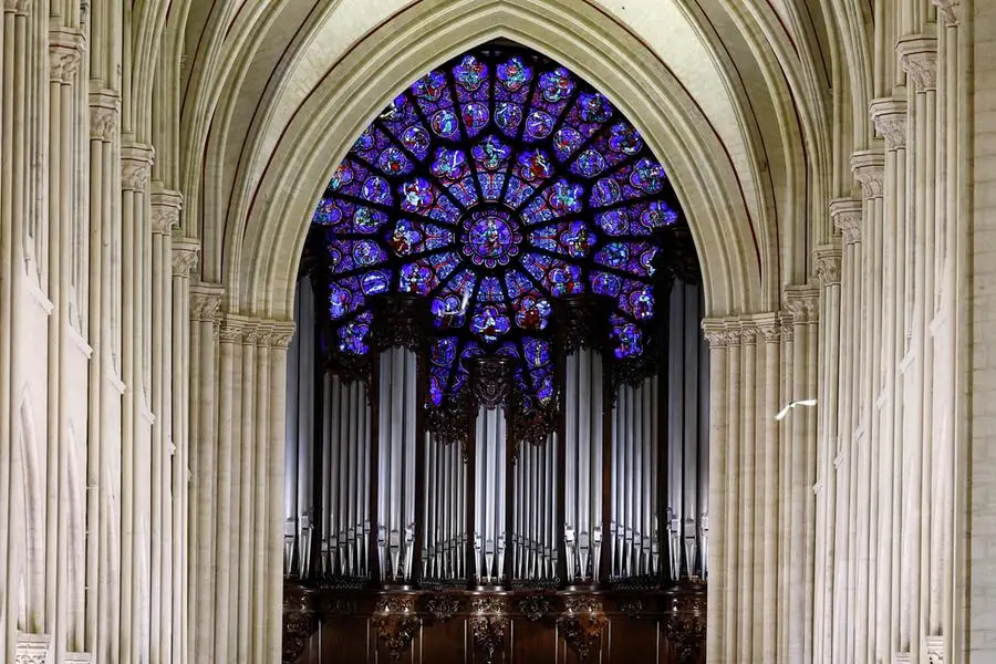 epa11764335 View of the Great Organ and the Western Rose window during the inaugural Mass, with the consecration of the high altar, at the Notre-Dame de Paris Cathedral in Paris, France, 08 December 2024. The Notre Dame de Paris Cathedral reopened on 07 December after nearly six years of renovation work following its destruction by a fire on 15 April 2019. EPA/SARAH MEYSSONNIER / POOL MAXPPP OUT