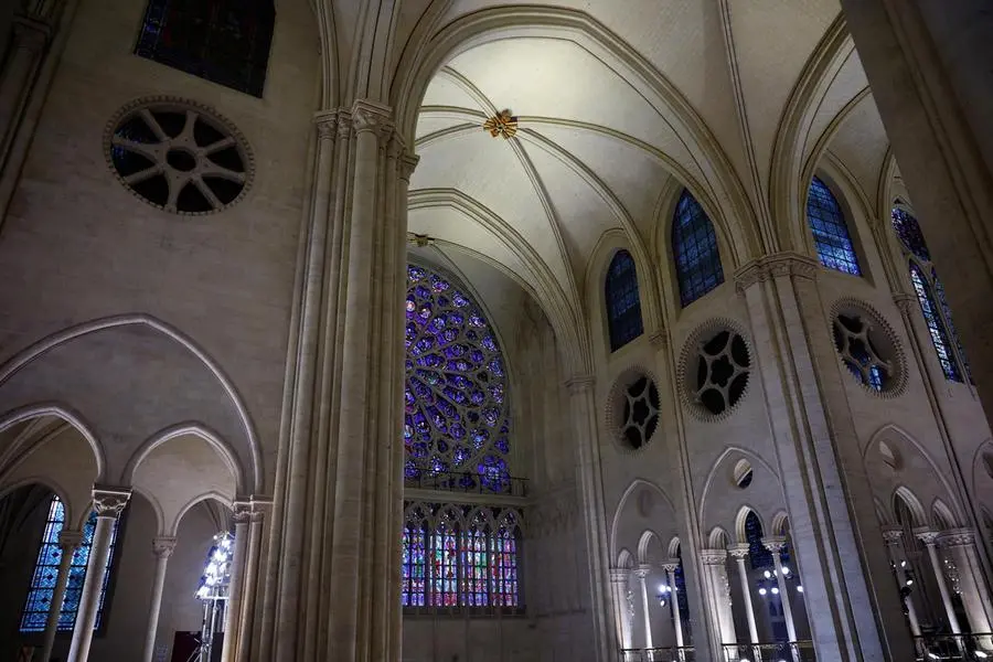 epa11764440 View of the stained glass windows during the inaugural Mass, with the consecration of the high altar, at the Notre-Dame de Paris Cathedral in Paris, France, 08 December 2024. The Notre Dame de Paris Cathedral reopened on 07 December after nearly six years of renovation work following its destruction by a fire on 15 April 2019. EPA/SARAH MEYSSONNIER / POOL MAXPPP OUT