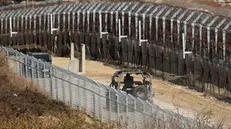 epa11766103 Israeli troops at the border with Syria near the Druze village of Majdal Shams, in the Israeli-annexed Golan Heights, 09 December 2024. The Israeli army announced it has deployed forces to strengthen the defense of the Golan Heights and the eastern Israeli border with Syria. Syrian rebels entered Damascus on 08 December 2024 and announced in a televised statement the 'Liberation of the city of Damascus and the overthrow of Bashar al-Assad', as well as the release of all the prisoners. EPA/ATEF SAFADI