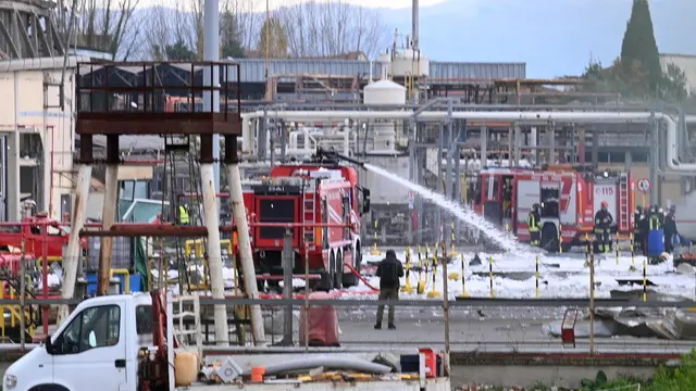 epa11766369 Firefighters work at the scene of an explosion at the 'Eni' fuel depot in Calenzano, Florence, Italy, 09 December 2024. The explosion killed two people, injured nine, and left three missing, according to Tuscany's governor Eugenio Giani. A fire broke out at the fuel storage, affecting just the loading area and not the tanks, according to a statement issued by Eni. EPA/CLAUDIO GIOVANNINI