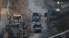 epa11766703 Israeli troops at the border with Syria near the Druze village of Majdal Shams, in the Israeli-annexed Golan Heights, 09 December 2024. The Israeli army announced it has deployed forces to strengthen the defense of the Golan Heights and the eastern Israeli border with Syria. Syrian rebels entered Damascus on 08 December 2024 and announced in a televised statement the 'Liberation of the city of Damascus and the overthrow of Bashar al-Assad', as well as the release of all the prisoners EPA/ABIR SULTAN