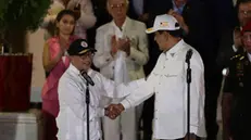 epa11268596 The president of Colombia, Gustavo Petro (L), poses with the president of Venezuela, Nicolas Maduro, after a meeting at the Miraflores Palace, in Caracas, Venezuela, on 09 April 2024. The meeting was cordially held despite the recent criticism by Petro on the elections process in Venezuela, where the principal opposition leader has been unable to register. EPA/Rayner Pena R.