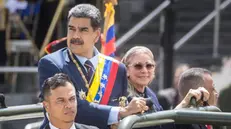 epa11461297 The president of Venezuela Nicolas Maduro (C) participates in a civic-military commemoration parade for Independence Day in Venezuela, in Caracas, Venezuela, 05 July 2024. On 05 July 1811, Congress declared the independence of the provinces of Venezuela, so this date is celebrated as its national day, according to the country's National Assembly. EPA/MIGUEL GUTIERREZ