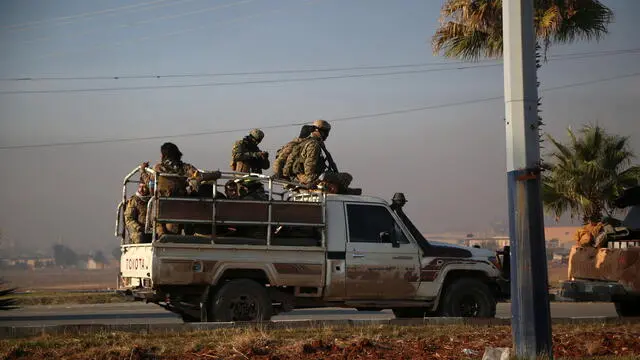 epa11752873 Armed men sit in the back of a truck driving in Aleppo after rebel forces took control of the city, in Aleppo, Syria, 02 December 2024. According to the Syrian Observatory for Human Rights (SOHR) on 30 November, militants opposing the Syrian government, seized Aleppo International Airport. Syrian opposition forces, led by the Islamist militant group Hayat Tahrir al-Sham (HTS) launched an offensive on 27 November, taking large parts of Aleppo, Syria's second-largest city. The offensive triggered counterattacks by the Syrian regime forces as well as Russian and Syrian airstrikes on opposition-controlled areas. More than 400 people, including civilians and militants have been killed since 27 November, SOHR stated, while the United Nations Office for the Coordination of Humanitarian Affairs (OCHA) stated that over 20,000 people have been internally displaced within Aleppo and to other governorates. EPA/BILAL AL HAMMOUD