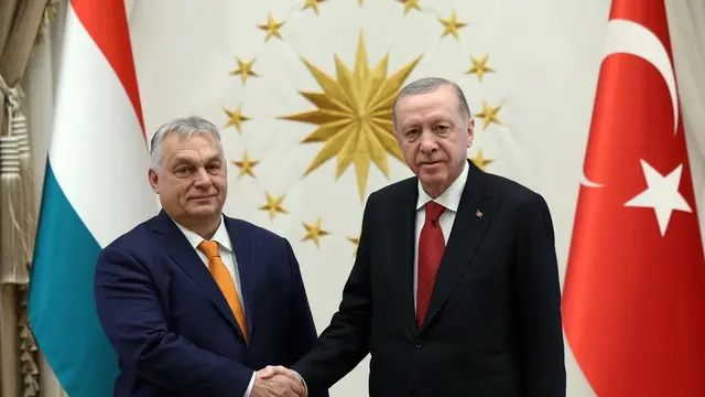 epa11772083 A handout photo made available by the Turkish Presidential press office shows Turkish President Recep Tayyip Erdogan (R) and Hungarian Prime Minister Viktor Orban (L) shaking hands during their meeting at the Presidential Palace in Ankara, Turkey, 12 December 2024. EPA/TURKISH PRESIDENTIAL PRESS OFFICE / HANDOUT HANDOUT EDITORIAL USE ONLY/NO SALES