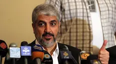 epa03649589 Hamas leader Khaled Meshaal speaks during the al-Quds conference, in Cairo, Egypt, 04 April 2013. Meshaal was elected on 01 April to lead Hamas for another four years at a closed-door meeting of the Islamist Palestinian movement's governing council in Cairo. Meshaal, 56, has headed Hamas' political bureau since 1996, and has effectively led the movement since the 2004 assassinations by Israel of its founders Sheikh Ahmed Yassin and Abdel Aziz al-Rantissi. EPA/KHALED ELFIQI