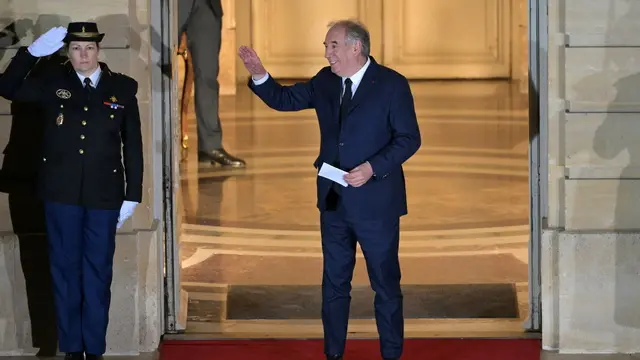epa11775190 Newly-appointed Prime Minister Francois Bayrou waves at the end of the handover ceremony at the Hotel Matignon in Paris, France, 13 December 2024. French President Macron named Francois Bayrou as the country's new prime minister on 13 December 2024. The appointment follows premier Michel Barnier's resignation after a no-confidence vote in the National Assembly on 04 December 2024. EPA/BERTRAND GUAY / POOL MAXPPP OUT