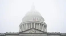 epa11768381 The US Capitol Building is shrouded in fog, in Washington, DC, USA, 10 December 2024. Multiple Trump administration nominees are at the Capitol today visiting with Senators ahead of confirmation hearings next year. EPA/GRAEME SLOAN