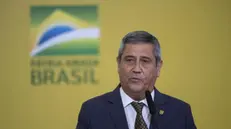 epa09849209 Defense Minister General Braga Netto participates in a ceremony for the Launch of New Deliveries of the Income and Opportunity Program at the Palacio do Planalto, in Brasilia, Brazil, 25 March 2022. EPA/Joedson Alves