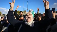 epaselect epa11774831 People gather to celebrate the opposition takeover of Damascus, following the Friday prayers, at Umayyad Square in Damascus, Syria, 13 December 2024. Hay'at Tahrir Al-Sham (HTS) leader Abu Mohammad Al-Jolani called on people across the country to celebrate 'the victory of the revolution' on 13 December, following the capture of Damascus and the overthrow of Bashar al-Assad on 08 December 2024. EPA/MOHAMMED AL RIFAI