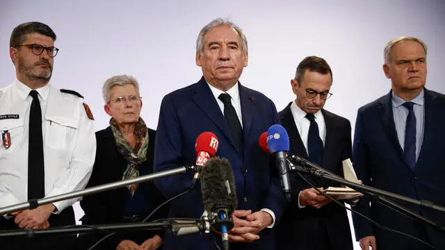 epa11777565 French Prime Minister Francois Bayrou (C) and outgoing Interior Minister Bruno Retailleau (2-R) hold a press conference following a government meeting about the situation in the French island territory of Mayotte hit by tropical cyclone Chido, at the Interior Ministry Crisis Centre in Paris, France, 14 December 2024. EPA/YOAN VALAT