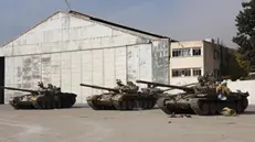 epa11772295 Damaged Syrian government tanks are seen in Mezzeh Military Airport in Damascus, Syria 12 December 2024. The Israeli army stated it has conducted airstrikes across Syria targeting strategic weapons stockpiles. Rebels ousted Syrian president Bashar al-Assad 08 December 2024. EPA/MOHAMMED AL RIFAI