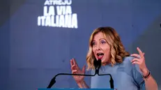Il presidente del Consiglio Giorgia Meloni durante l’evento di chiusura della manifestazione politica di Fratelli d’ltalia (Fdl), Atreju la via italiana, al Circo Massimo, Roma, 15 dicembre 2024. ANSA/ANGELO CARCONI