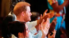 epa11554535 Britain's Prince Harry, Duke of Sussex (C) and his wife Meghan, Duchess of Sussex attend the 'Afro Women and Power' forum in Cali, Colombia, 18 August 2024. The Duke and Duchess of Sussex are on a visit to the country at the invitation of the Colombian vice president. EPA/ERNESTO GUZMAN