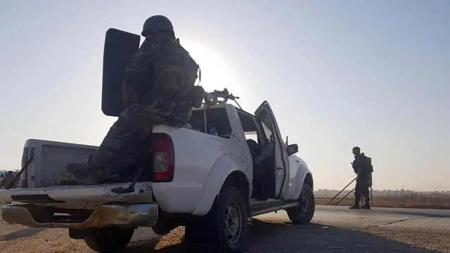 epa07919653 A handout photo made available by the official Syrian Arab News Agency (SANA) shows Syrian army soldiers arriving at Tal Tamr town, in the northwestern Hasaka, Syria, 14 October 2019. According to SANA, Syrian army units were deployed in Tal Tamr town in the northwestern Hasaka, as well as several villages and towns in the countryside of Raqqa, to counter the Turkish military operation. Syrian forces were deployed a day after Russian-brokered deal between the Kurds and Syrian regime that allows the deployment of Syrian troops in the northeast areas for the first time in years, after Turkey launched an offensive targeting Kurdish forces. EPA/SANA HANDOUT HANDOUT EDITORIAL USE ONLY/NO SALES