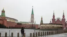 epa11240588 A Russian policeman guards the closed entrance to the Red Square, following a terrorist attack on the Crocus City hall concert venue, in Moscow, Russia, 24 March 2024. Russia started a day of national mourning for the victims of the terrorist attack in Crocus City Hall in Krasnogorsk. On 22 March, a group of gunmen attacked the Crocus City Hall in the Moscow region, Russian emergency services said. According to the latest data from the Russian Investigative Committee, 152 people died and more than 100 were hospitalized. On the morning of 23 March, the director of the Russian FSB, Alexander Bortnikov, reported to Russian President Vladimir Putin about the detention of 11 people, including all four terrorists directly involved in the terrorist attack. EPA/SERGEI ILNITSKY