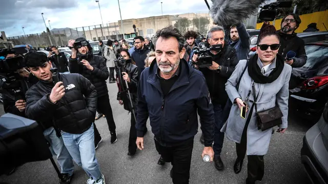 epa11786976 Oscar Camps (C), founder and director of the Spanish NGO Open Arms leaves the bunker courtroom of the Pagliarelli prison, in Palermo, Sicily, Italy, 20 December 2024. Prosecutors in the Sicilian city have requested a six-year jail term for Salvini on charges of abduction and refusal to perform public acts for not allowing the disembarkation of 147 migrants rescued by the Spanish NGO Open Arms vessel for 19 days in August 2019 when he was interior minister. EPA/IGOR PETYX