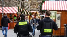 epa11754609 Police walk at the Breitscheidplatz Square Christmas market in Berlin, Germany, on 03 December 2024. German Interior Minister Nancy Faeser has called for caution at Christmas markets amid warnings from security officials. While no concrete threats exist, authorities note the events could be potential targets for Islamist groups. EPA/FILIP SINGER