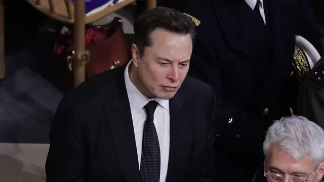 epa11763165 Businessman Elon Musk (C) attends the reopening ceremony of the Notre Dame de Paris Cathedral in Paris, France 07 December 2024. Paris’ Cathedral took almost 6 years to rebuild after been severely damaged in a devastating fire that broke out on 15 April 2019. EPA/CHRISTOPHE PETIT TESSON / POOL