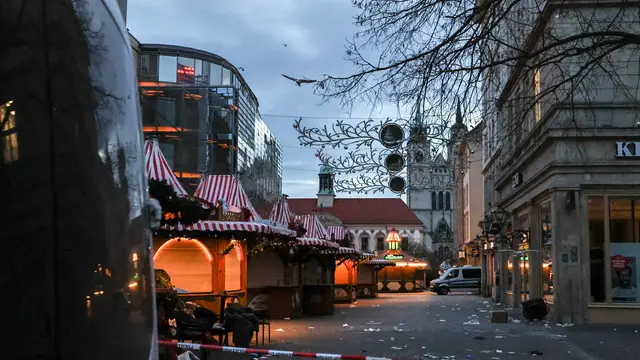 epa11787868 The scene of a vehicle-ramming attack is cordoned off at the Christmas market in Magdeburg, Germany, 21 December 2024. According to the Magdeburg police, at least two people were confirmed dead, scores were injured, and the suspect, a Saudi national, was taken into custody after he drove a car into a crowd at Magdeburg' Christmas market on 20 December. EPA/FILIP SINGER