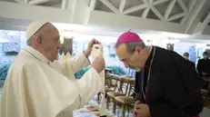 This handout photo provided by the Vatican Media shows Pope Francis imposing the Pallium on His Beatitude Pierbattista Pizzaballa, Patriarch of Jerusalem of the Latins, in the Santa Marta Chapel at the Vatican, 28 October 2020. ANSA/ VATICAN MEDIA +++ HO - NO SALES, EDITORIAL USE ONLY +++