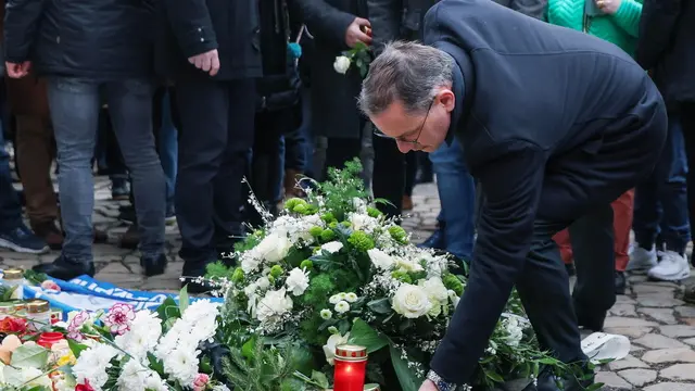 epa11788242 Alternative for Germany (AfD) party co-leader Tino Chrupalla lays flowers at the official mourning site in front of St. John's Church, following a vehicle-ramming attack on the Christmas market, in Magdeburg, Germany, 21 December 2024. According to Saxony-Anhalt State Premier Reiner Haseloff, five people were confirmed dead and at least 200 were injured, after a car was driven into a crowd at Magdeburg's Christmas market on 20 December. The suspect, a Saudi national, was taken into custody. EPA/FILIP SINGER