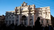 Fontana di Trevi, parzialmente riaperta dopo i lavori di restauro delle fontane monumentali, Roma, 20 dicembre 2024. ANSA/ANGELO CARCONI