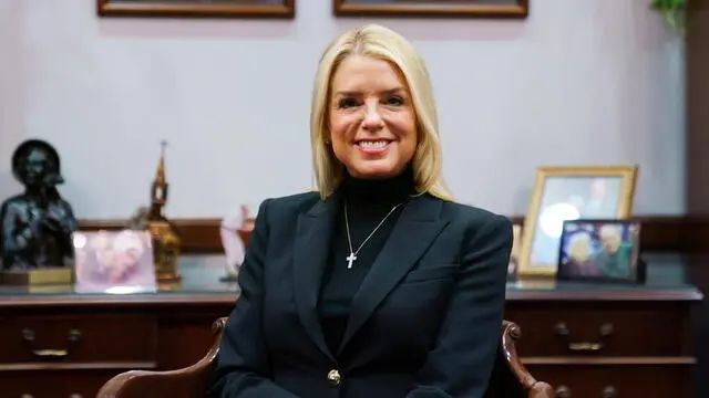 epa11753661 Pam Bondi, US President-elect Donald Trump's nominee for Attorney General, poses for a photo during a meeting with Republican Senator from Iowa and incoming Senate Judiciary Committee Chair Chuck Grassley (not pictured) at the US Capitol, Washington, DC, USA, 02 December 2024. Bondi is attending several meetings on Capitol Hill as she seeks confirmation for the position of US Attorney General. EPA/WILL OLIVER